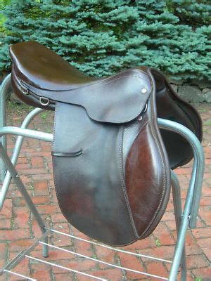 Brown leather with suede knee rolls. . Courbette husar saddle